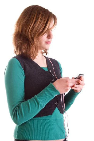 ผู้หญิงวัยรุ่นกับเครื่องเล่น MP3 ของเธอ — ภาพถ่ายสต็อก