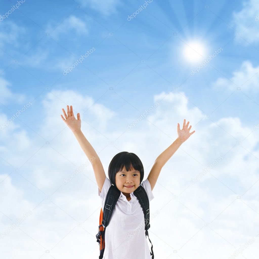 Asian school girl arms up in the air