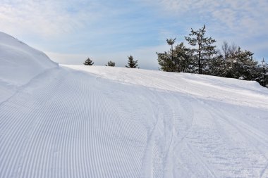 Slope on the skiing resort Rovaniemi, Finland clipart