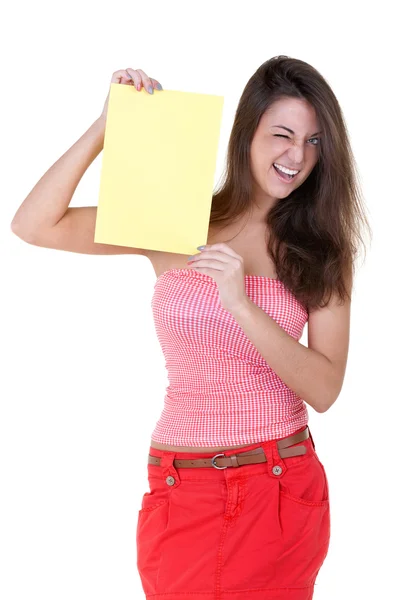 Meisje met een blanco vel papier knipoogt — Stockfoto