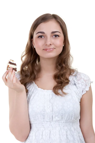 Young woman eating the cake — Stock Photo, Image
