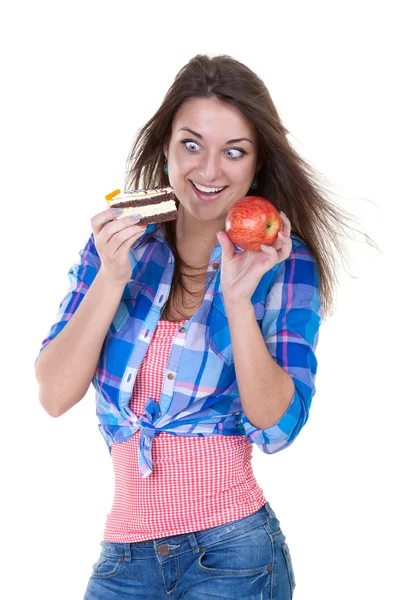 Portrait of a girl with an apple and a cake — Stock Photo, Image