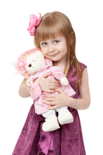 Porträtt av en liten flicka 4 år gammal med en plysch leksak — Stockfoto