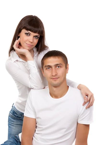Portrait of a loving couple in the studio on a white — Stock Photo, Image