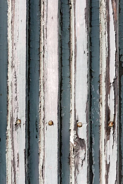 Een achtergrond van close-up verweerde wit geschilderd hout — Stockfoto