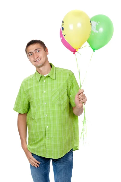 Щасливий літній чоловік з різнокольоровими повітряними кулями, що святкують його народження — стокове фото