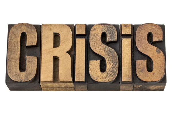 Crisis word in vintage wood type — Stok fotoğraf