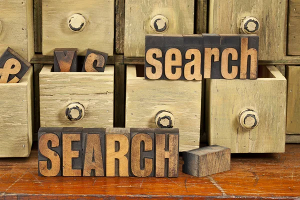 Search word concept in wood type — Stock Photo, Image