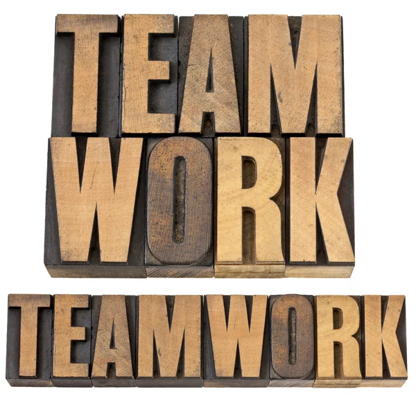 Palavra de trabalho em equipe em tipo de madeira — Fotografia de Stock