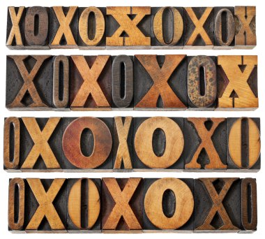 Letters O and X in wood type clipart