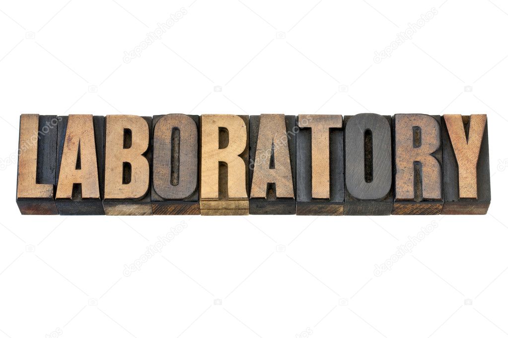 Palabra de laboratorio en el tipo de madera — Fotos de Stock