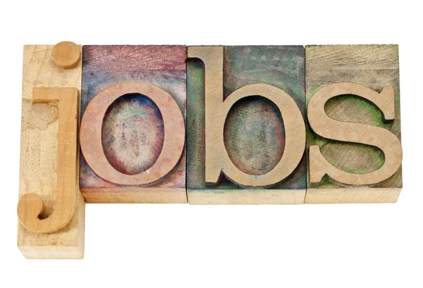 Jobs mot en letterpress type bois — Photo