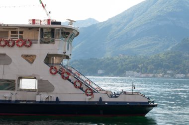 Ferry passing lake Como, Italy clipart