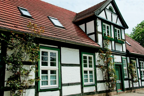 stock image Cottage with flowers