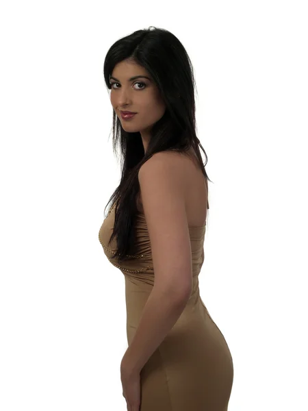 Junge Frau aus dem Nahen Osten im Kleid von der Seite Stockbild