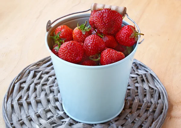 Berries of strawberry in a bucket — Stock Photo, Image