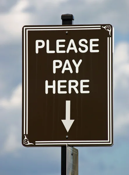 Bezahlen hier Zeichen — Stockfoto