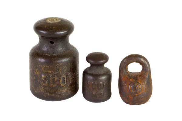 Three of the old weights for scales — Stock Photo, Image