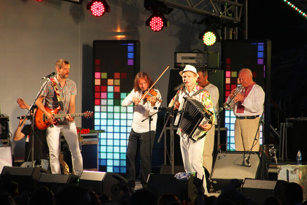 Ukrainian Singer Oleg Skripka with accordion (right)
