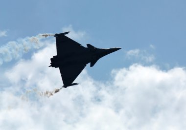 Demonstrative performance by the jet Dassault Rafale at the air clipart