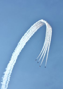 Aerobatic group in the sky clipart