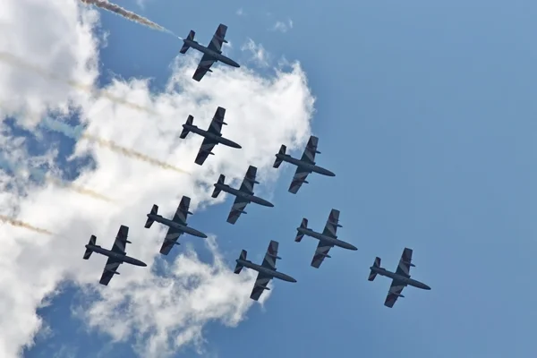 Demonstrative performance of Italian aerobatic team at the air s — Stock Photo, Image