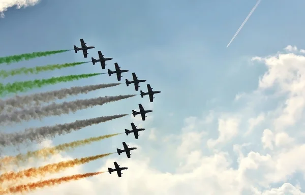 Demonstrative performance of Italian aerobatic team at the air show — Stock Photo, Image