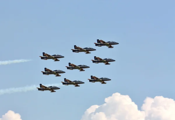 Demonstrative performance of Italian aerobatic team at the air s — Stock Photo, Image