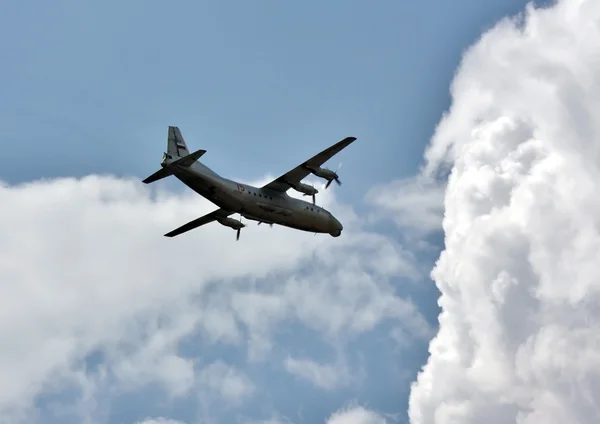 Russian transport airplane in the summer sky — Stock Photo, Image