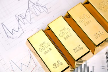 Gold bars on graphs and statistics clipart