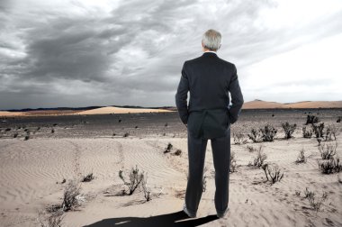 Businessman in the Desert clipart