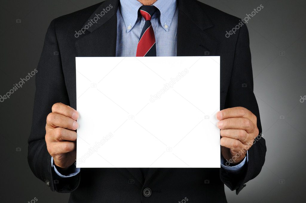 Businesman Holding Blank Sign
