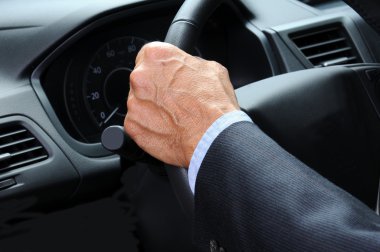 Man's Hand on Steering Wheel clipart