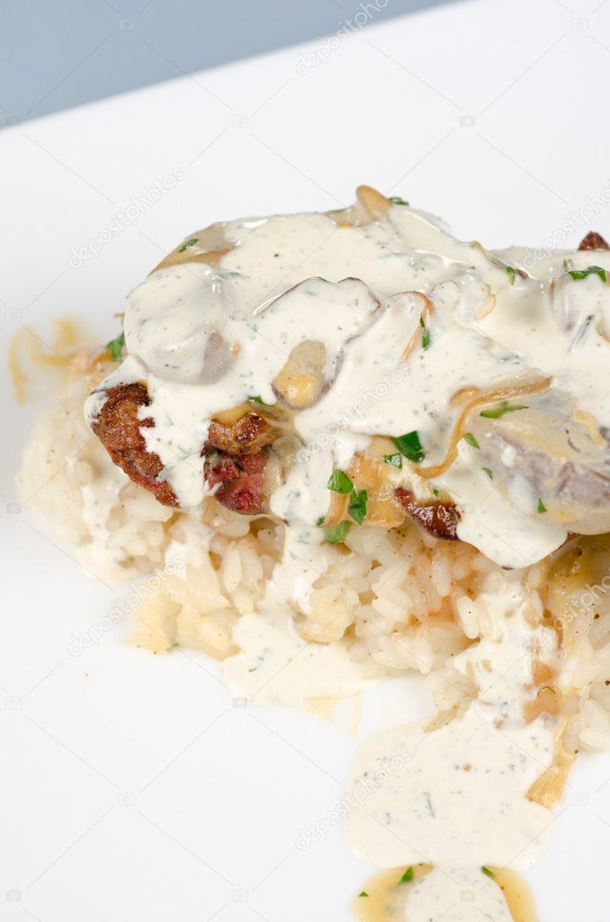 Risotto with chicken liver Stock Photo by ©olinchuk 10883993