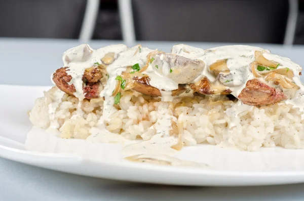 Risotto with chicken liver — Stock Photo, Image