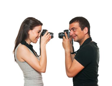 Young couple photographing themselves clipart