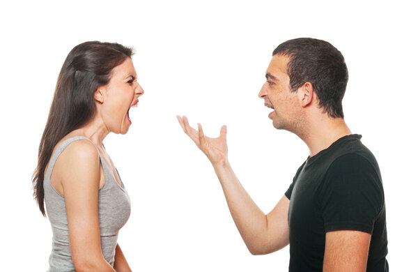 Unhappy young couple having an argument. Isolated on white.