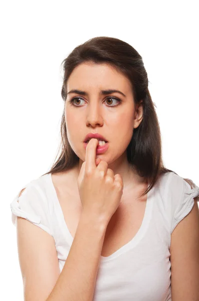 Young female biting her nails — Stock Photo, Image