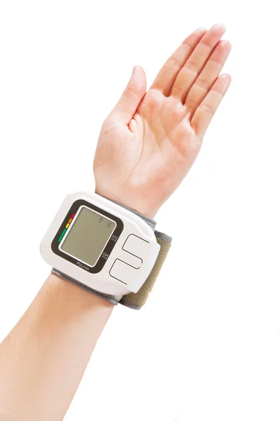 Close up view of a blood pressure monito on hand Stock Image