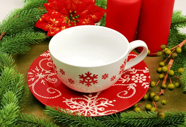 Рождественская чашка на винтажном фоне Рождества — стоковое фото
