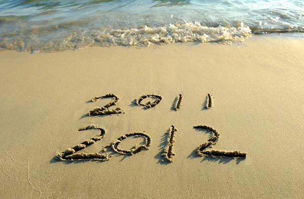 2012 yeni yıl mesajı kum plaj — Stok fotoğraf