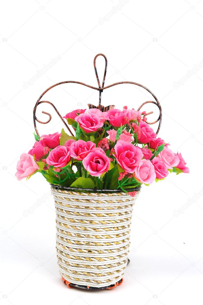 Basket of flowers isolated on white background