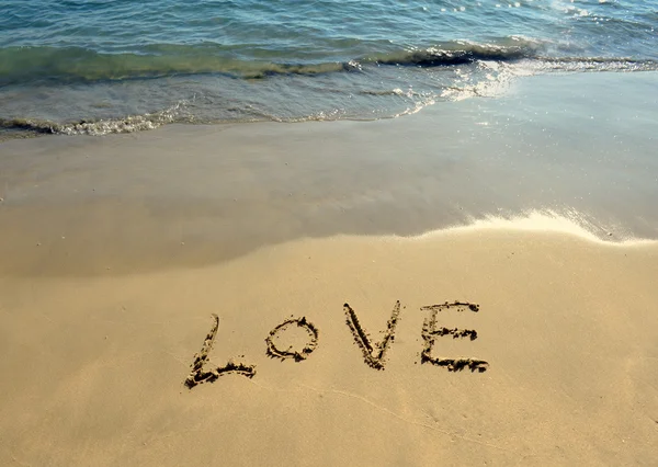 "Kocham cię "w piasku — Zdjęcie stockowe