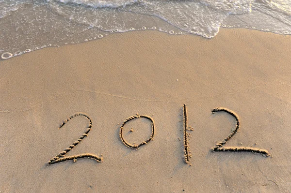 Number 2012 on the beach of sunrise — Stock Photo, Image