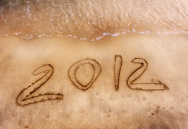 Počet 2012 na pláži sunrise — Stock fotografie