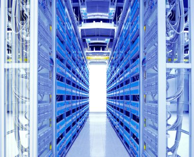 Shot of network cables and servers in a technology data center clipart