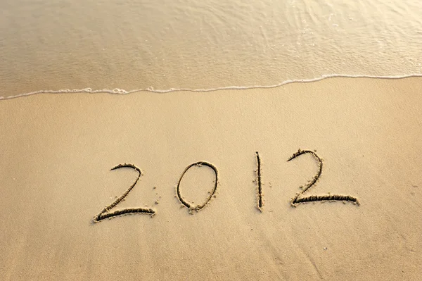 2012 roku nowa wiadomość na piaszczystej plaży — Zdjęcie stockowe