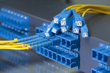 Fiber optical network cables patch panel and switch clipart