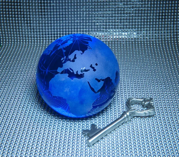 Earth with key — Stock Photo, Image