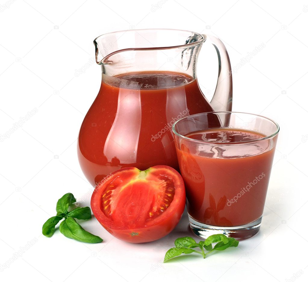Jug, glass of tomato juice and fruits